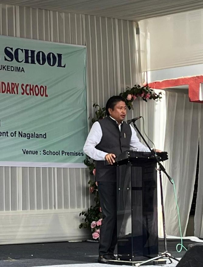 Minister Jacob Zhimomi speaking during at Highland Hall School on November 19. (Morung Photo)  